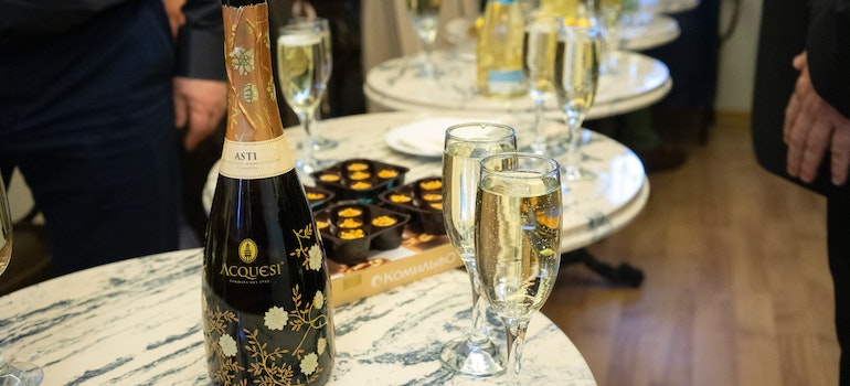 tables with glasses and bottles