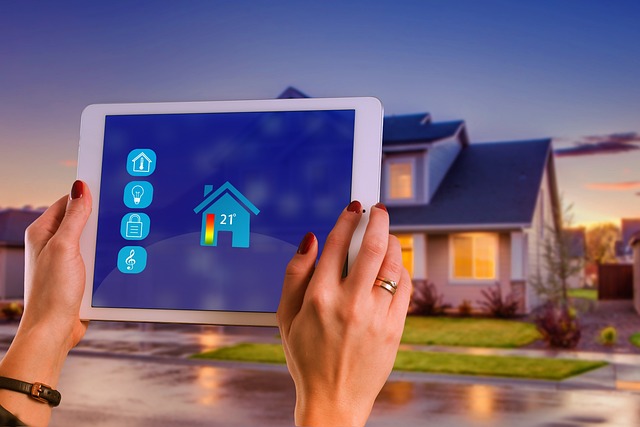 A person using a tablet to control home features.
