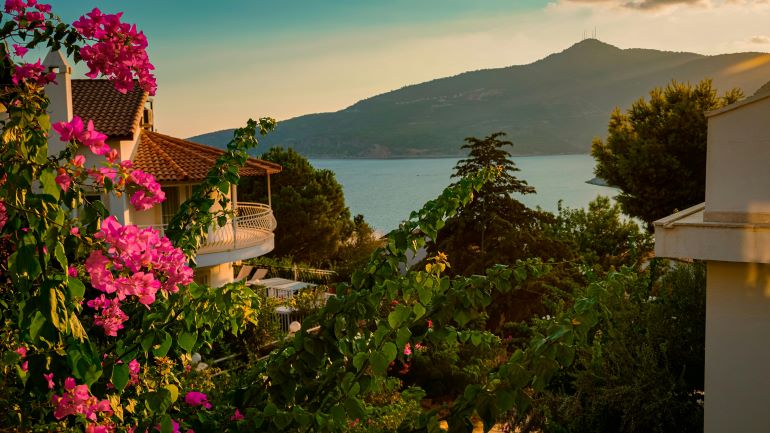 Mountain views, private pool, and sun loungers arranged for luxurious outdoor relaxation.